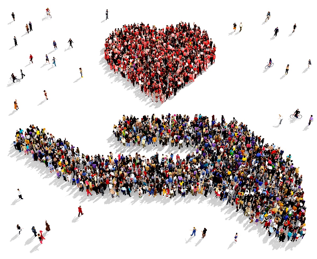 Hand mit Herz aus Menschen